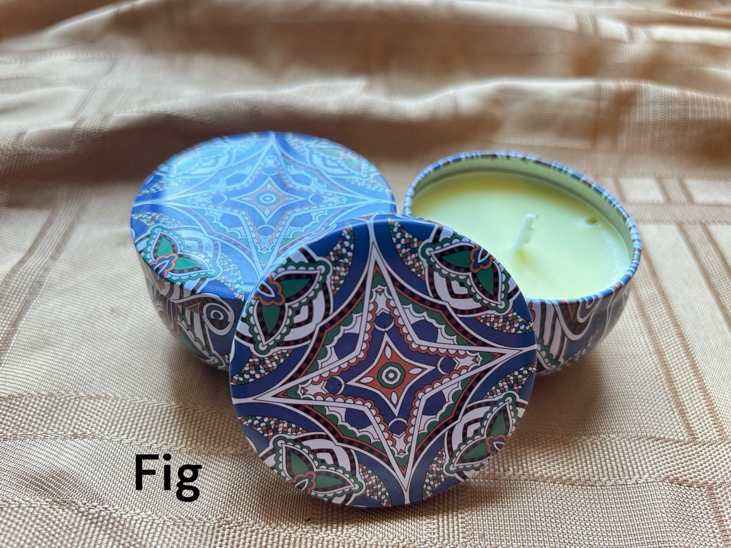 Fig scented mosaic candle encassed in a stunning vibrant tin. It blends striking visual artistry with a premium fragrance experience! 