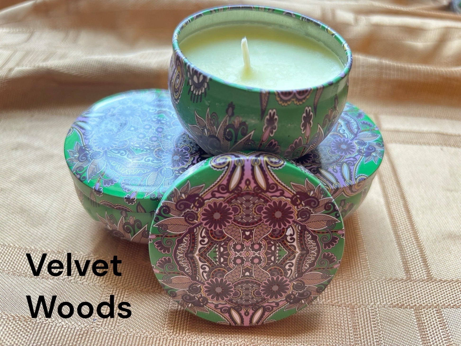 Floral and wood scented mosaic candle encassed in a stunning vibrant tin. It blends striking visual artistry with a premium fragrance experience! 