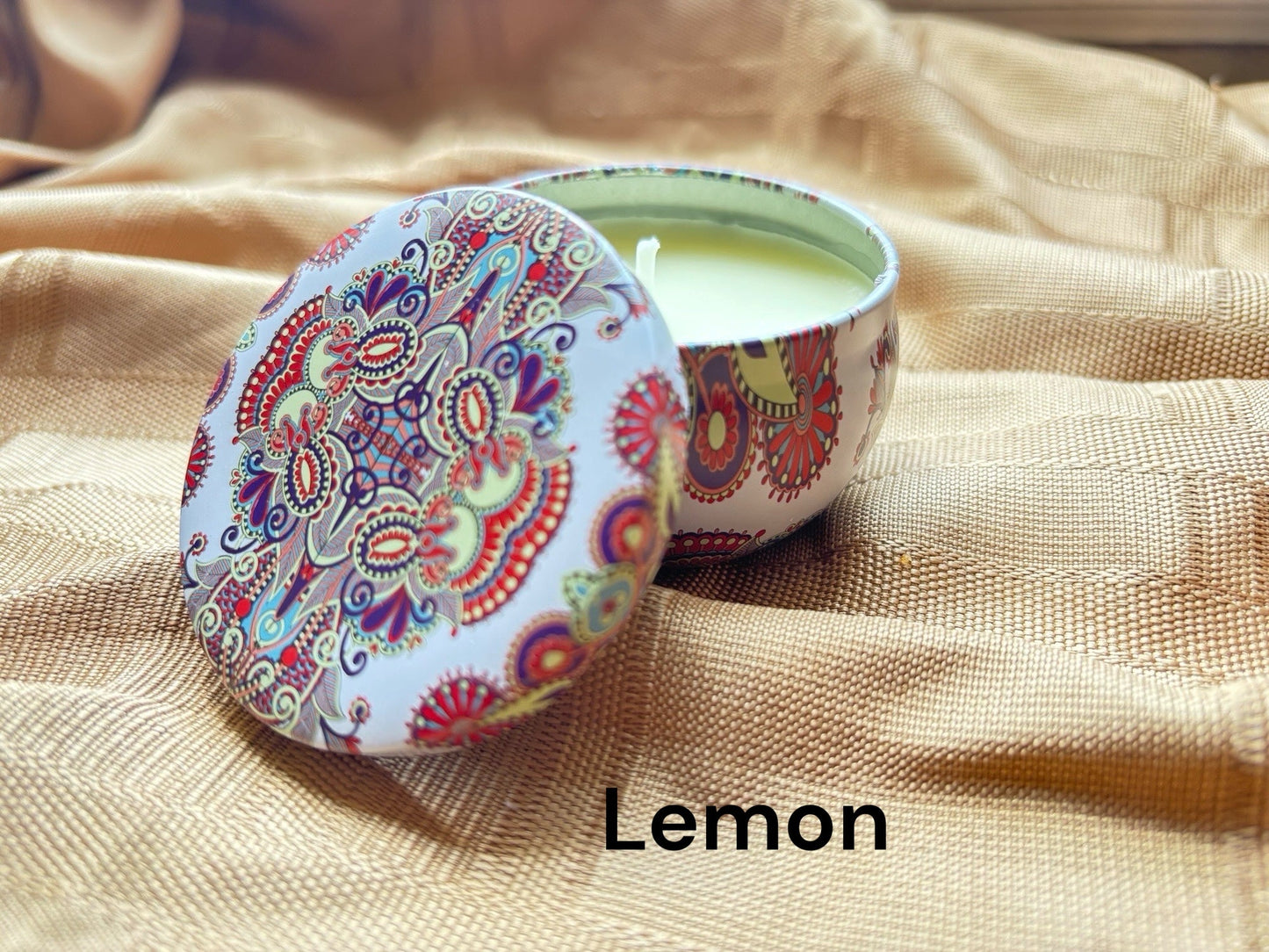 Lemon scented mosaic candle encassed in a stunning vibrant tin. It blends striking visual artistry with a premium fragrance experience! 