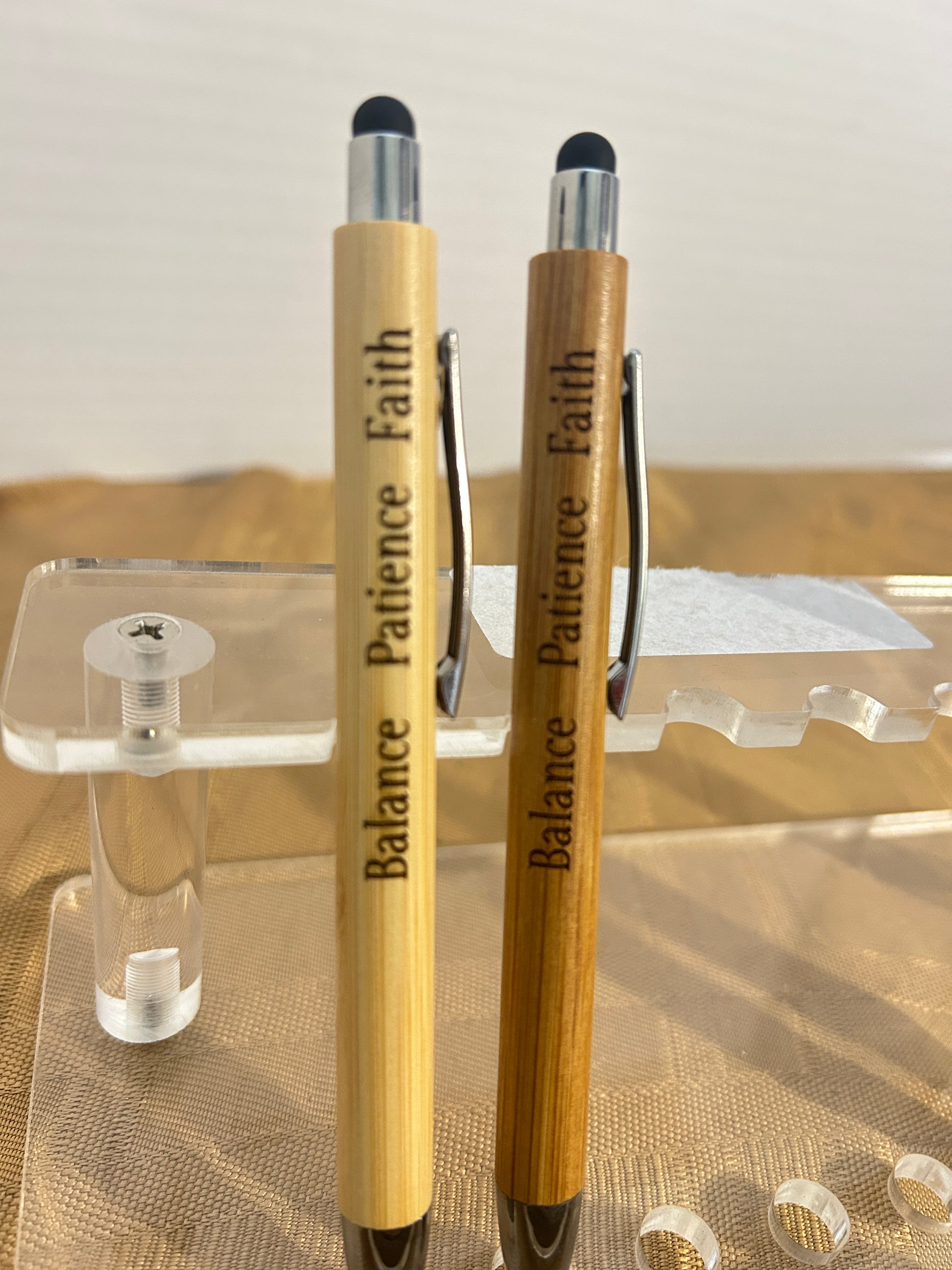Elevate your daily routine or give a truly meaningful gift with this premium Pen and Stylus Set.

The pens are functional pieces of art designed to inspire. 
"Balance Patience and Faith" - three important ingredients to life fufillment; It is the underlying motivation of our business.