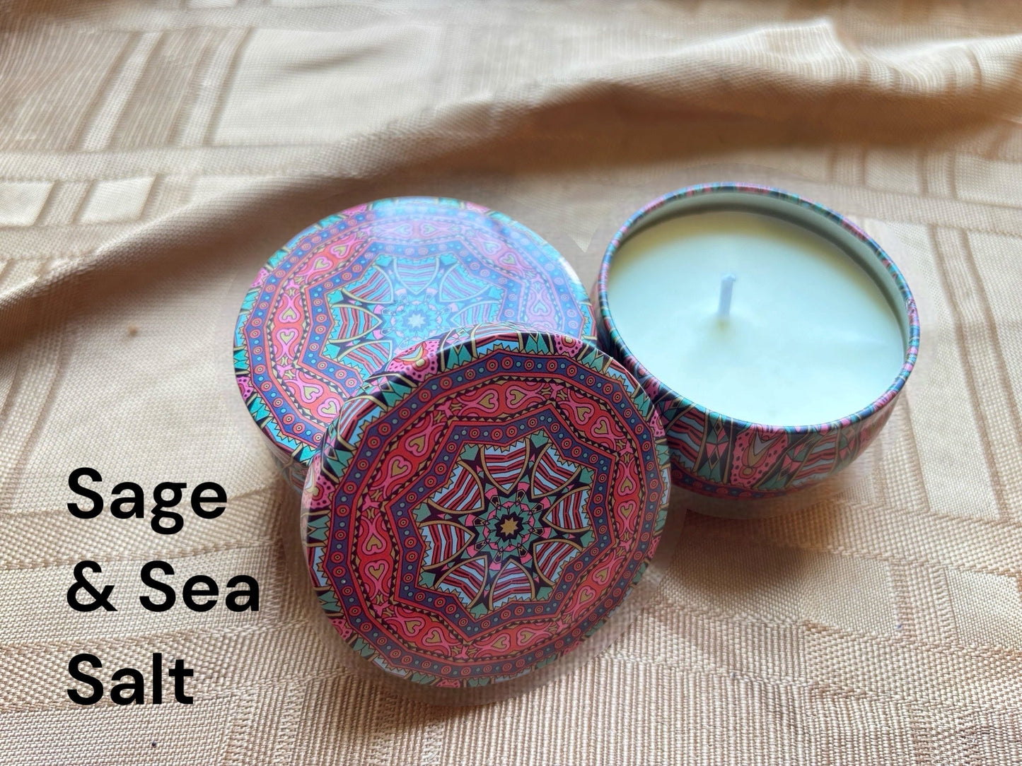 Sage/Sea Salt scented mosaic candle encassed in a stunning vibrant tin. It blends striking visual artistry with a premium fragrance experience! 